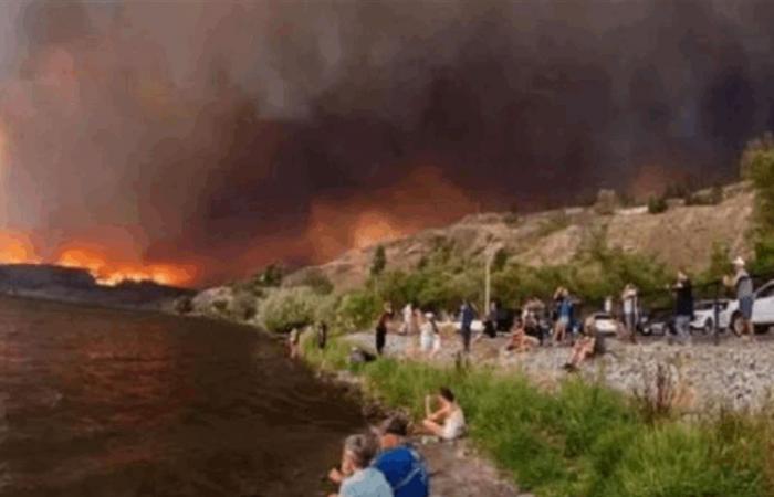 تضاعف خلال ليلة واحدة.. حريق يطرد الآلاف من منطقة العنب في كندا