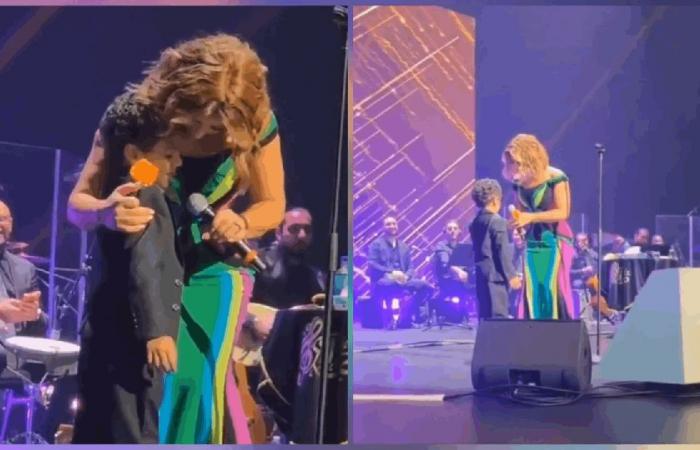 "لكي لا يغار زوجي".. أصالة تمازح طفلاً على المسرح (فيديو)